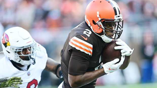 Nov 5, 2023; Cleveland, Ohio, USA; Cleveland Browns wide receiver Amari Cooper (2) runs with the ball after a catch as Arizona Cardinals safety Budda Baker (3) defends during the second half at Cleveland Browns Stadium. 